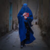 Afghan Woman with a book in hand